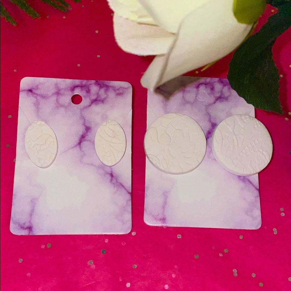 White detailed studs